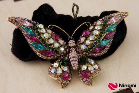 Резинка "Бронзовий метелик з самоцвітами" на чорному оксамиті - Фото